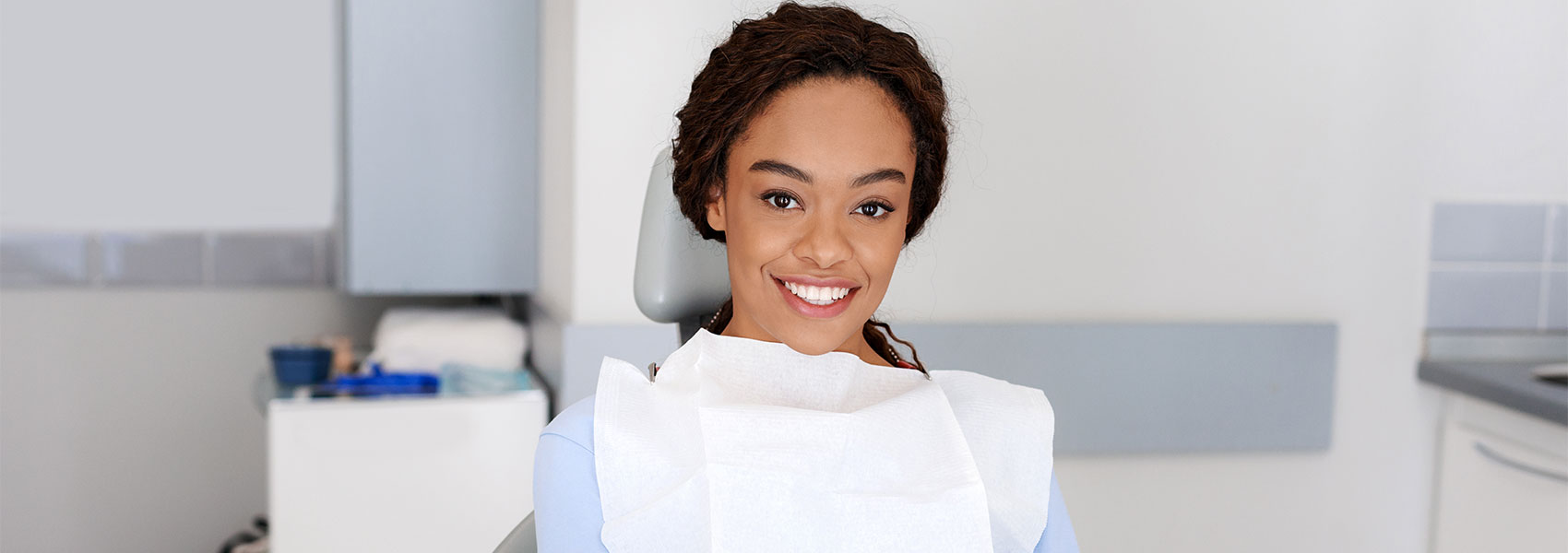 Lady smiling at dental