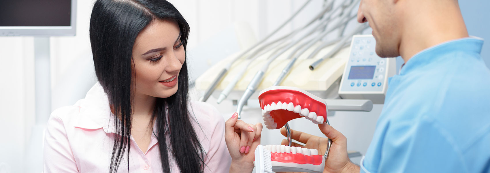 Dentist explain to patient about the treatments